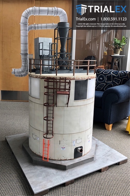 Demo of a 3D silo shows the blueprint schematic and details that include a worker inside the silo, photo of silo, animation of how sawdust is removed from silo.